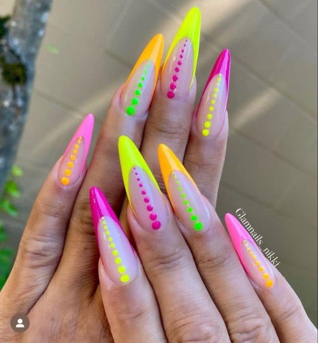 Neon pink and yellow nails with polka dots