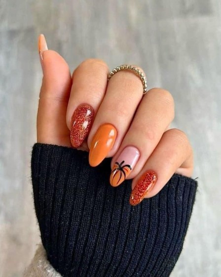 inspiring burnt orange nails with glitter