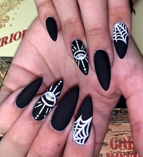 Webbed matte black nails